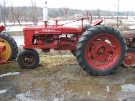 Farmall H. Runs good. $1200