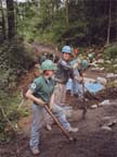 digging trail for retaining wall construction