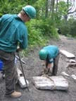 Removing highline straps from a rock