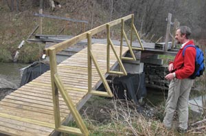 volunteer looks at bridge