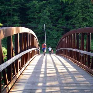 man and child on open bridge