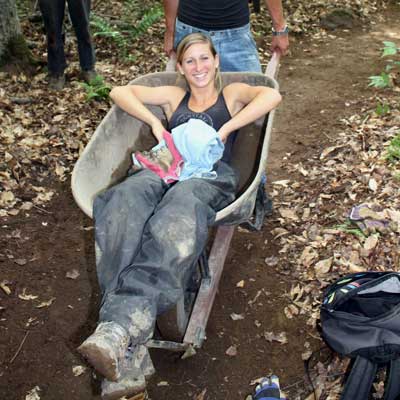 woman in wheelbarrow