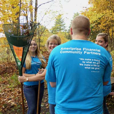 volunteers rake leaves