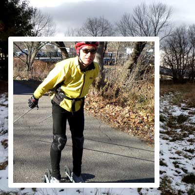 roller skiing on trail.