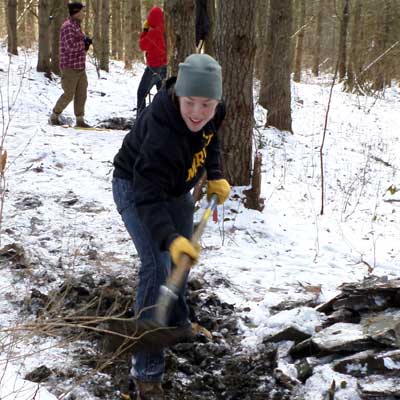 woman shovels