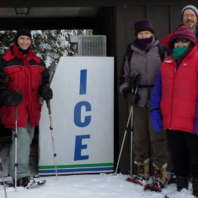 snowshoers pose