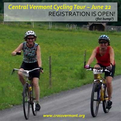 women biking by farm