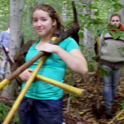 women carrying tools