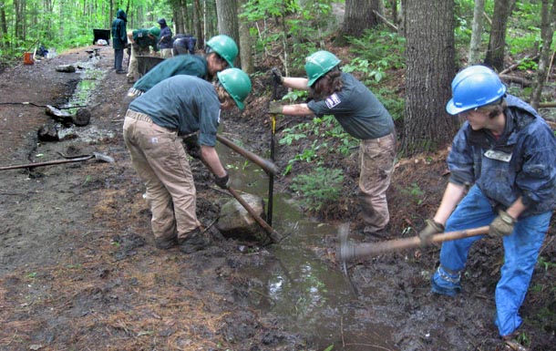VYCC crew digs ditch to fix washout