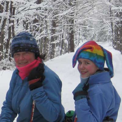 women on snowy trail
