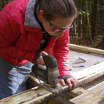volunteers cuts lumber