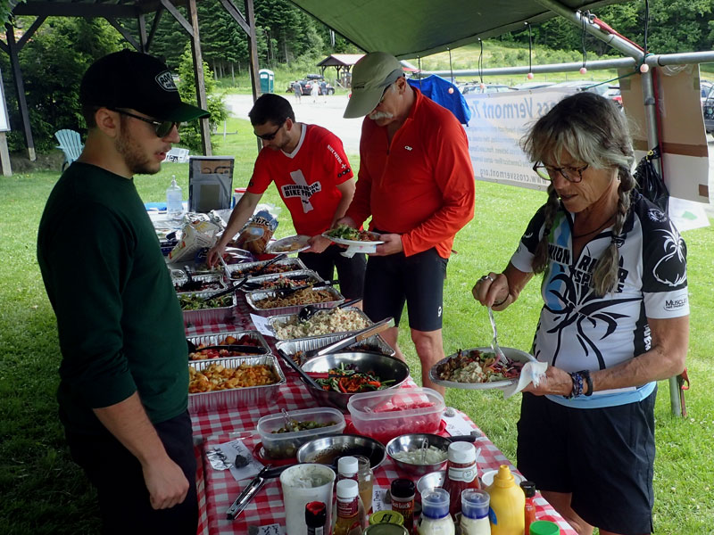 cyclists enjoy lunch buffet