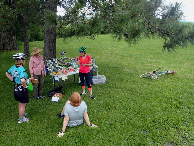 cyclists talking at rest stop