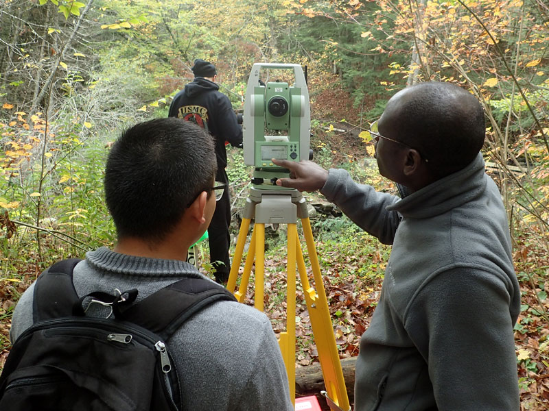 engineering students help on trail